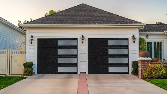 garage with black garage doors